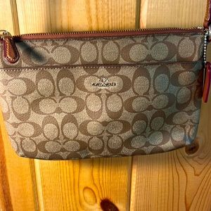Coach Brown Coated Canvas East/West Pop Up Pouch Crossbody Bag. Like new.